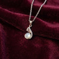 Embraced Devotion  Necklace