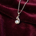 Embraced Devotion  Necklace